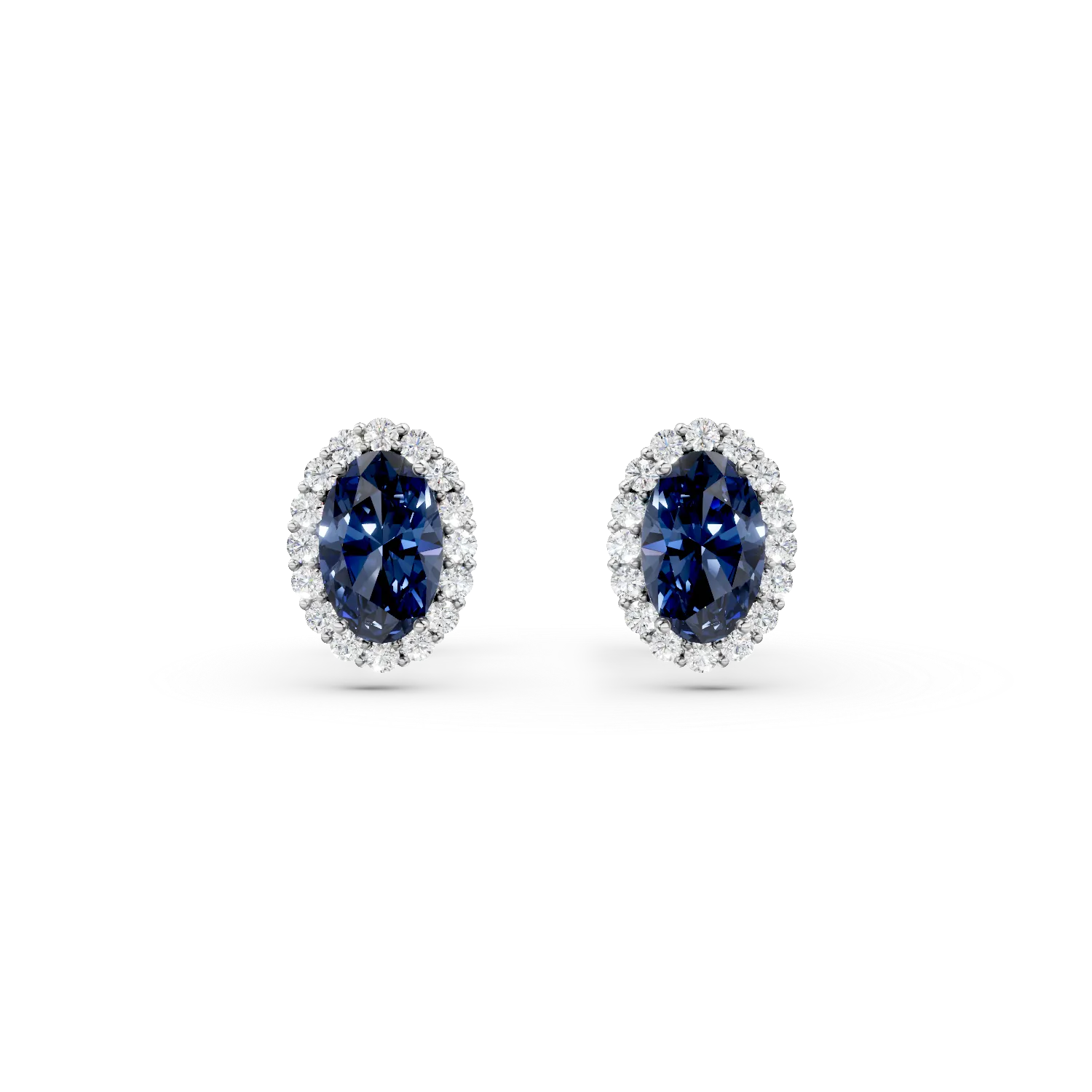 Cercei din aur alb cu zirconii albastre si transparente